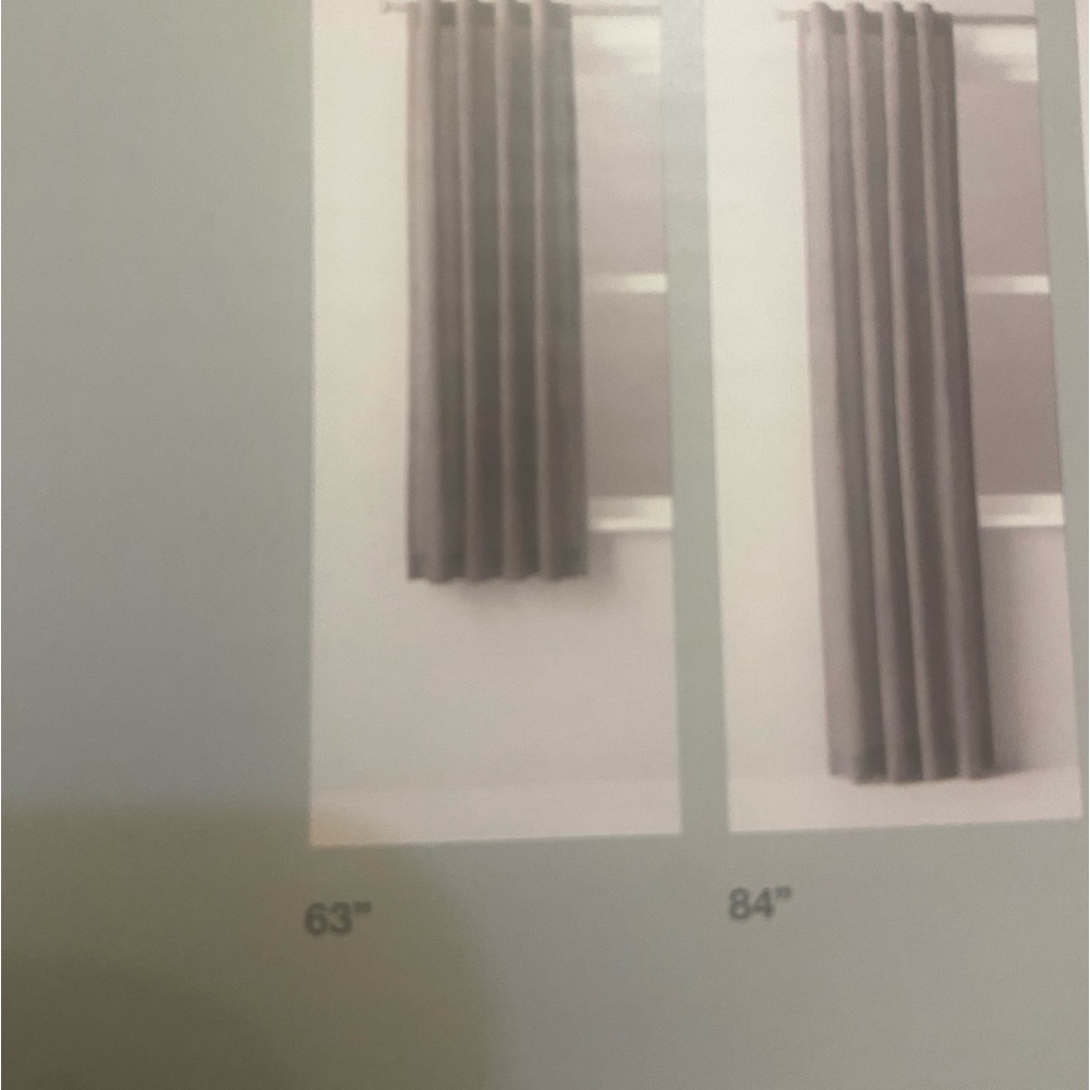 Light filtering target made by design Tan Curtain panels 2 piece set 63”